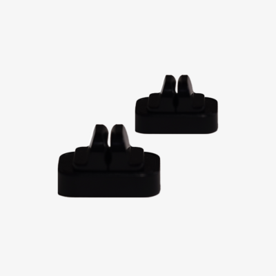 Two black LEGO bricks with curved studs, spaced apart on a white background (top-down view).