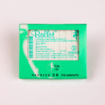 Bright green Ballet box of disposable needles for electrolysis, labeled 'Needles 50 Filaments' with barcode and small text readable on the package.