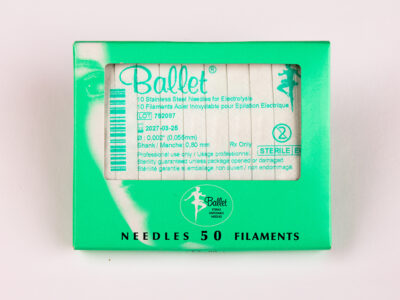 Bright green Ballet box of disposable needles for electrolysis, labeled 'Needles 50 Filaments' with barcode and small text readable on the package.